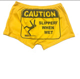 "caution: slippery when wet" booty shorts