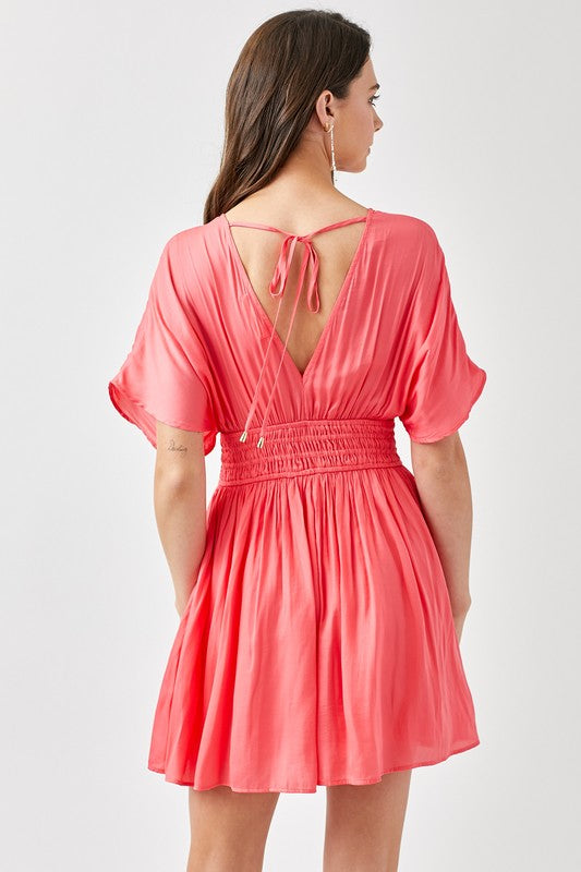 SMOCKED WAIST WITH TASSEL STRAP FLARE DRESS
