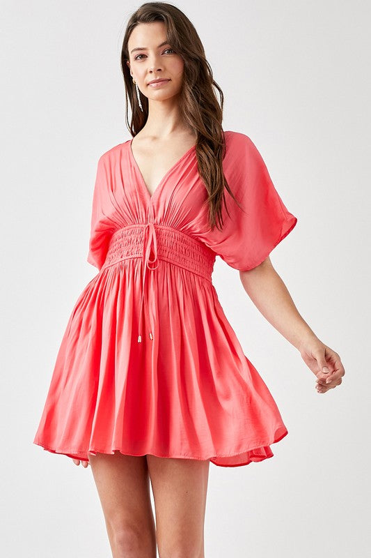 SMOCKED WAIST WITH TASSEL STRAP FLARE DRESS