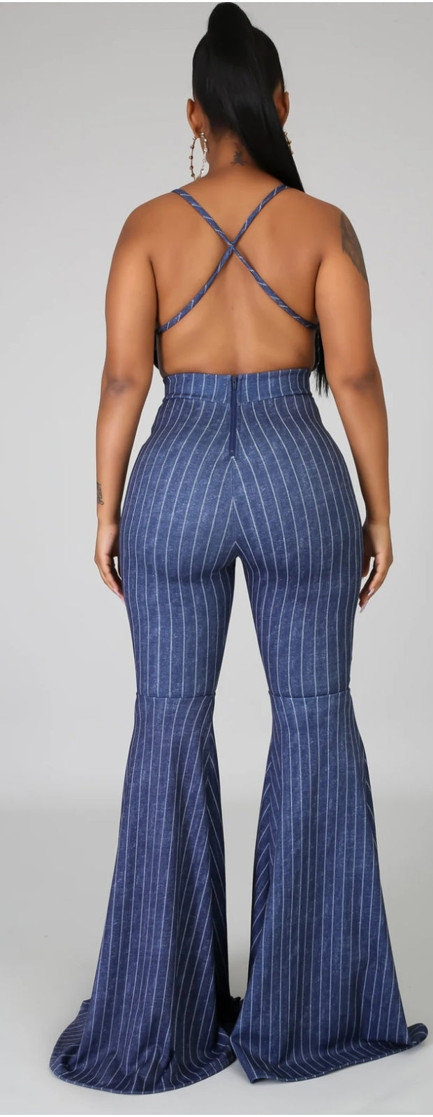 stretch denim criss cross back bell bottom jumpsuit